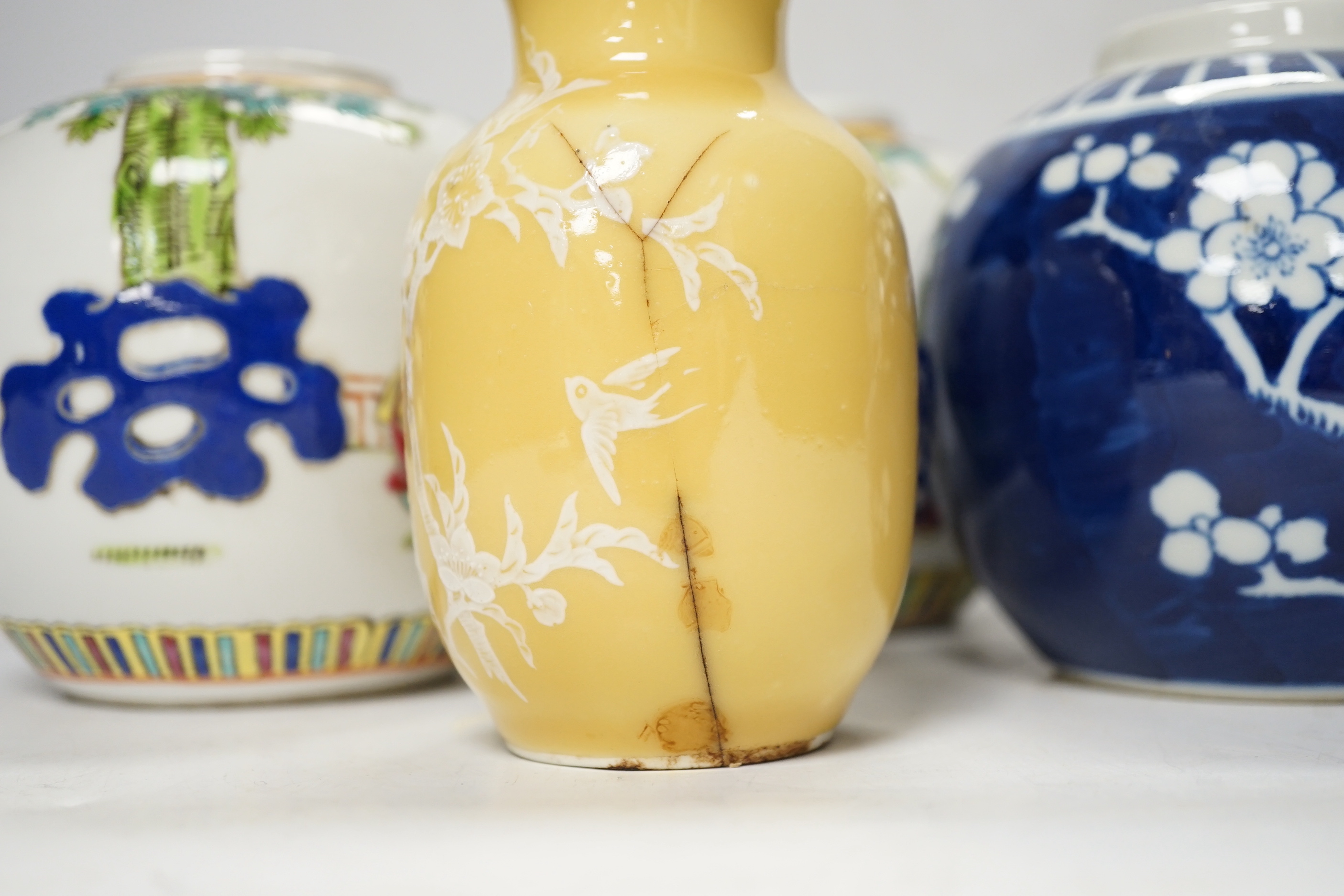 A Chinese blue and white ginger jar, a green two-handled double gourd vase, a pair of vases, and another, tallest 15cm